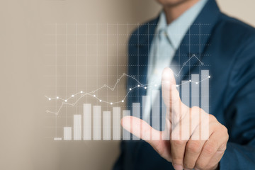 Business development to success and growing growth concept, Businessman pointing graph corporate future growth plan