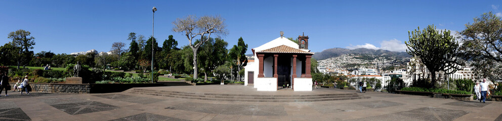 Fototapeta premium The Santa Catarina Park overlooking the harbour in Funchal Portugal is a haven of shady trees and lawns in the centre of the city 