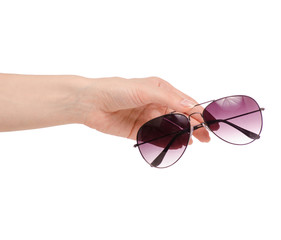 Female sunglasses in hand