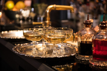 Champagne drinks in glasses on the bar counter