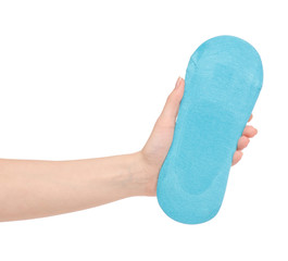 The blue no show socks in hand