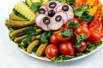 Salad with fresh summer vegetables, white background