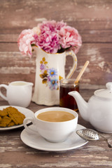 Cup of Tea on a Distressed Wood Table