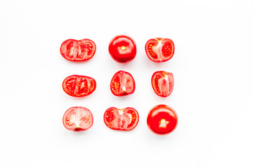 Layout of fresh red tomatoes on white background top view pattern