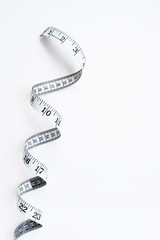 close up of measuring tape isolated on white background