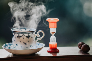 Elegant tea cup and hourglass stand shelf
