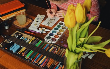 00:18 | 00:19 1×  female artist painter painting a picture of a easter bunny
