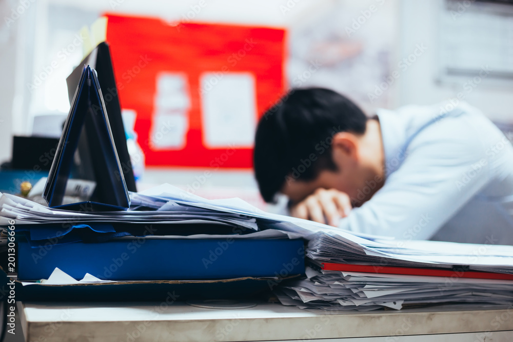 Wall mural stressful and frustrated young asian business office worker having overwork problem crisis with tons