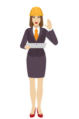Businesswoman in construction helmet holding a digital tablet PC and greeting someone with his hand raised up
