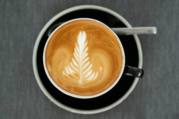 Top view hot coffee Leaf shape black cup