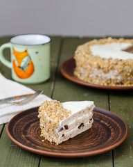 Homemade walnut cake with sour cream and prunes