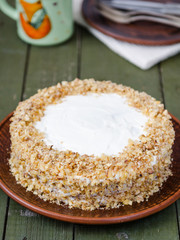 Homemade walnut cake with sour cream and prunes