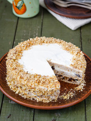 Homemade walnut cake with sour cream and prunes