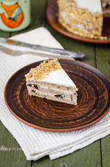 Homemade walnut cake with sour cream and prunes