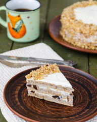 Homemade walnut cake with sour cream and prunes