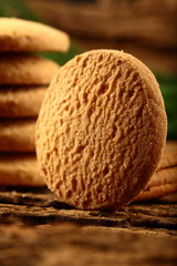 Fresh baked cookies texture on rustic background.