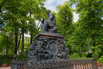 SAINT PETERSBURG, RUSSIA - AUGUST 18, 2017: The monument to the fabulist Ivan Krylov. Summer garden. It was established in 1855 near the main Avenue