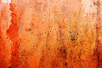 Old metal red painted background with streaks of rust for creativity, textures and backgrounds.