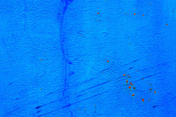 Old metal blue painted background with streaks of rust for creativity, textures and backgrounds.