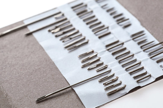 Photo of hand-sewing needles types. Close-up view
