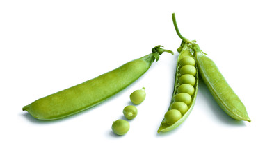 Green peas, close-up view, isolated on white background