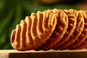Homemade cashew nuts cookies on wooden background.