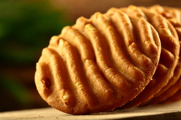 Homemade cashew nuts cookies on wooden background.