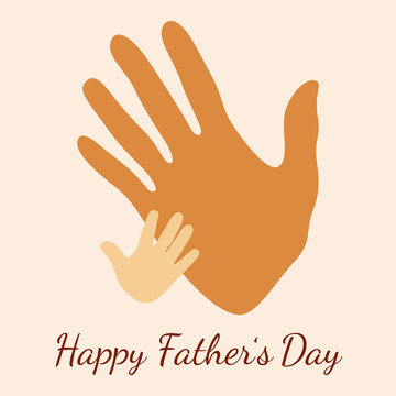 Happy Fathers Day. Handprint of father and child.
