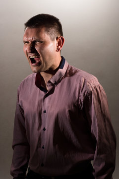 Portrait of a screaming man.