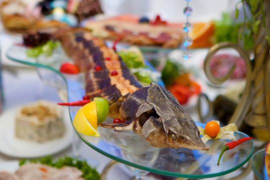 The food in the restaurant fish sturgeon on the tray