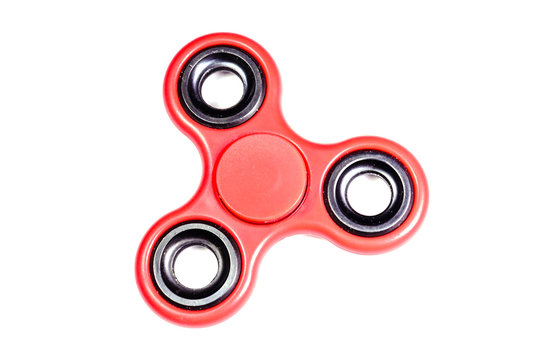 Red fidget spinner isolated on white