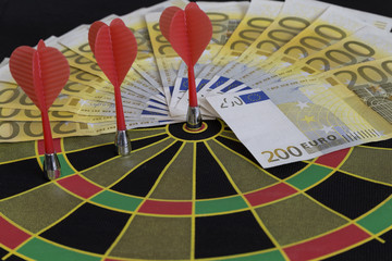 play gambling in your life. money on the dart.