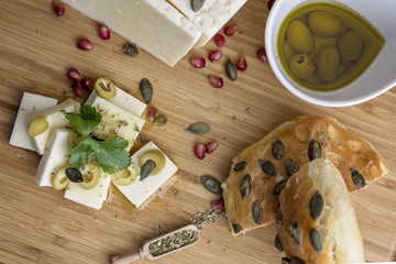 Fototapeta premium Table decoration of different flavors of cheese