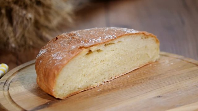 freshly baked bread on wooden cutting board