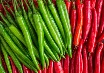 Colorful patterned surface of peppers for cooking.