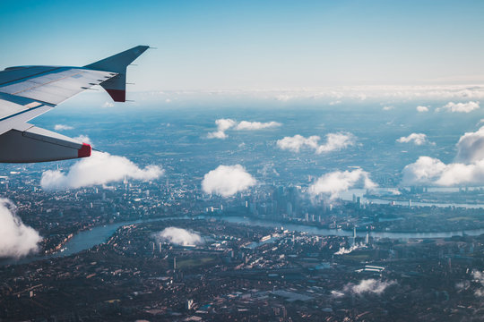 Aerial View From The Airplane Over London Central City And River Themse