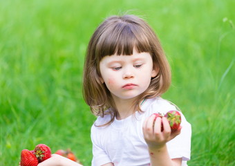  face, strawberry eating, serious, close up