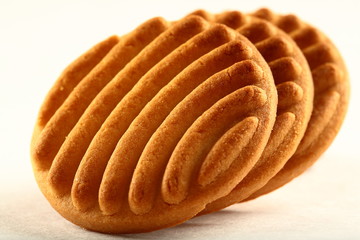 Homemade almond cookies on white background.