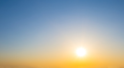 evening low sun on a clear sky background, bright sunset