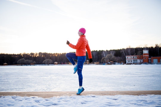 Portrait of sports girl on morning exercise in winter