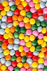 Colorful  candy pattern background. Different Small colored candies texture. Top view..