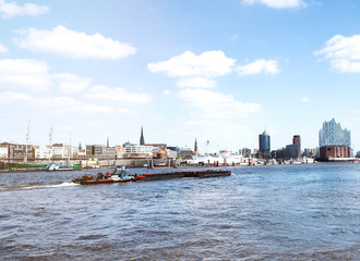 Fototapeta premium Hamburg harbor waterfront at Elbe river on sunny day