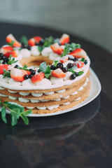 fruit cake with strawberries mint and blueberry