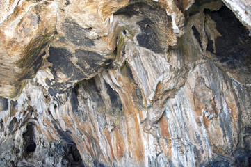 Interior of a big littoral cave on the cliffed coast 