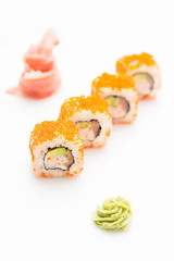 Sushi rolls with avocado shrimp and Philadelphia cheese. Isolated. Sushi roll on a white background.
