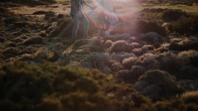 Loving happy and very beautiful couple walking in nature 