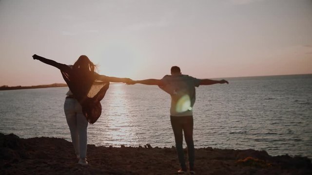 Loving happy and very beautiful couple walking in nature 
