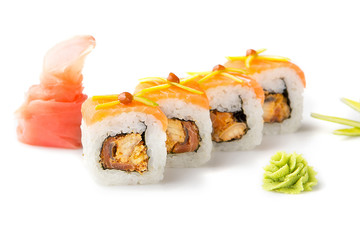Delicious, appetizing sushi rolls with smoked tuna and tobiko sauce. Isolated. Sushi roll on a white background.