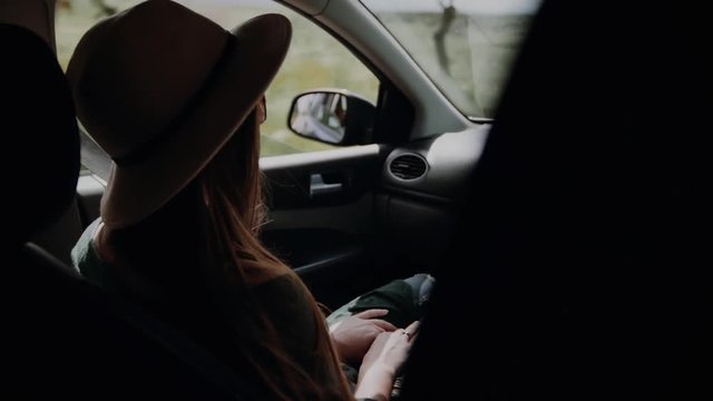 girl with long hair in the car