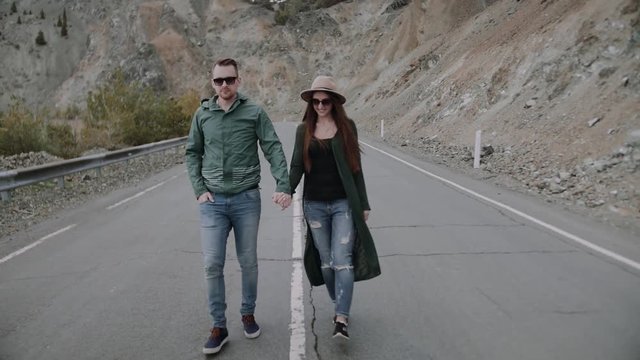 Loving happy and very beautiful couple walking in nature 